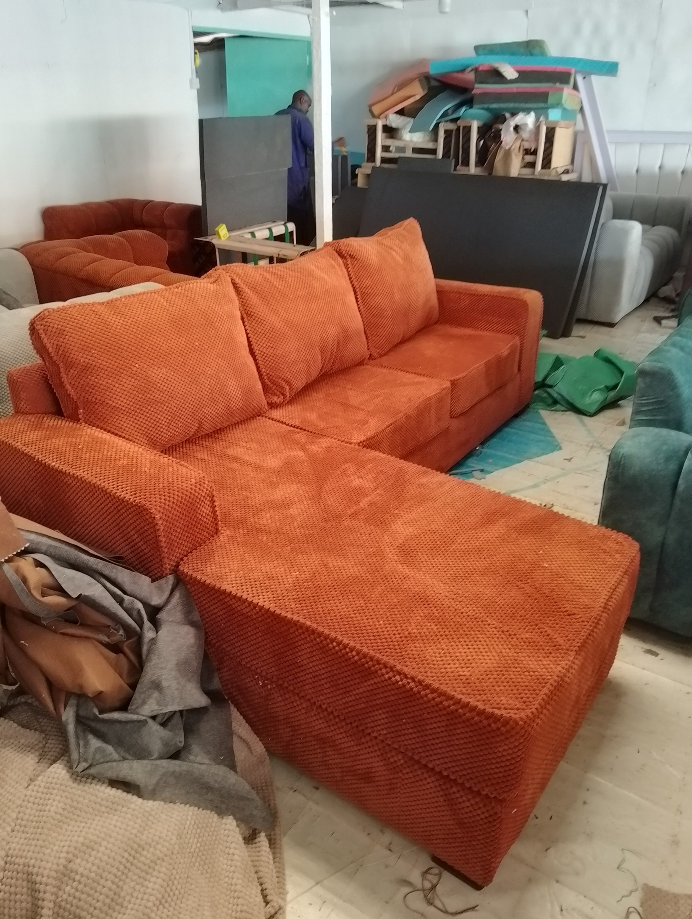 Elegant living room furnished with warm wood furniture, showcasing handcrafted craftsmanship